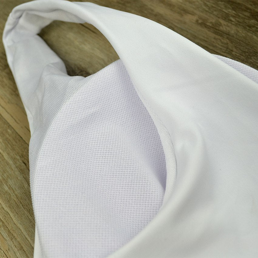 White V‑neck one‑piece monokini with hollow cut‑outs at the waist, sleeveless design, displayed on a plain background.