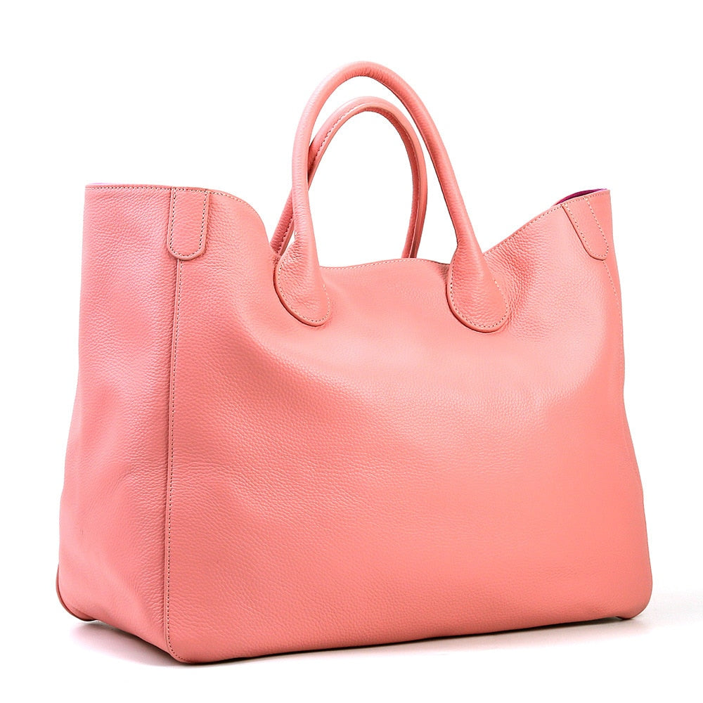 Pink bag with a white background sold at PeachyBeanz.
