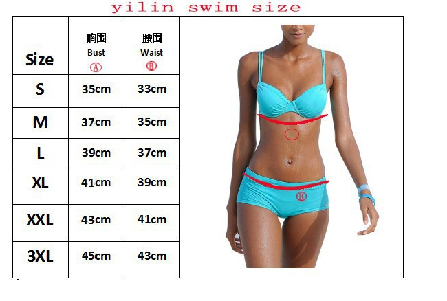 Woman wearing a blue bikini with size chart on a white background