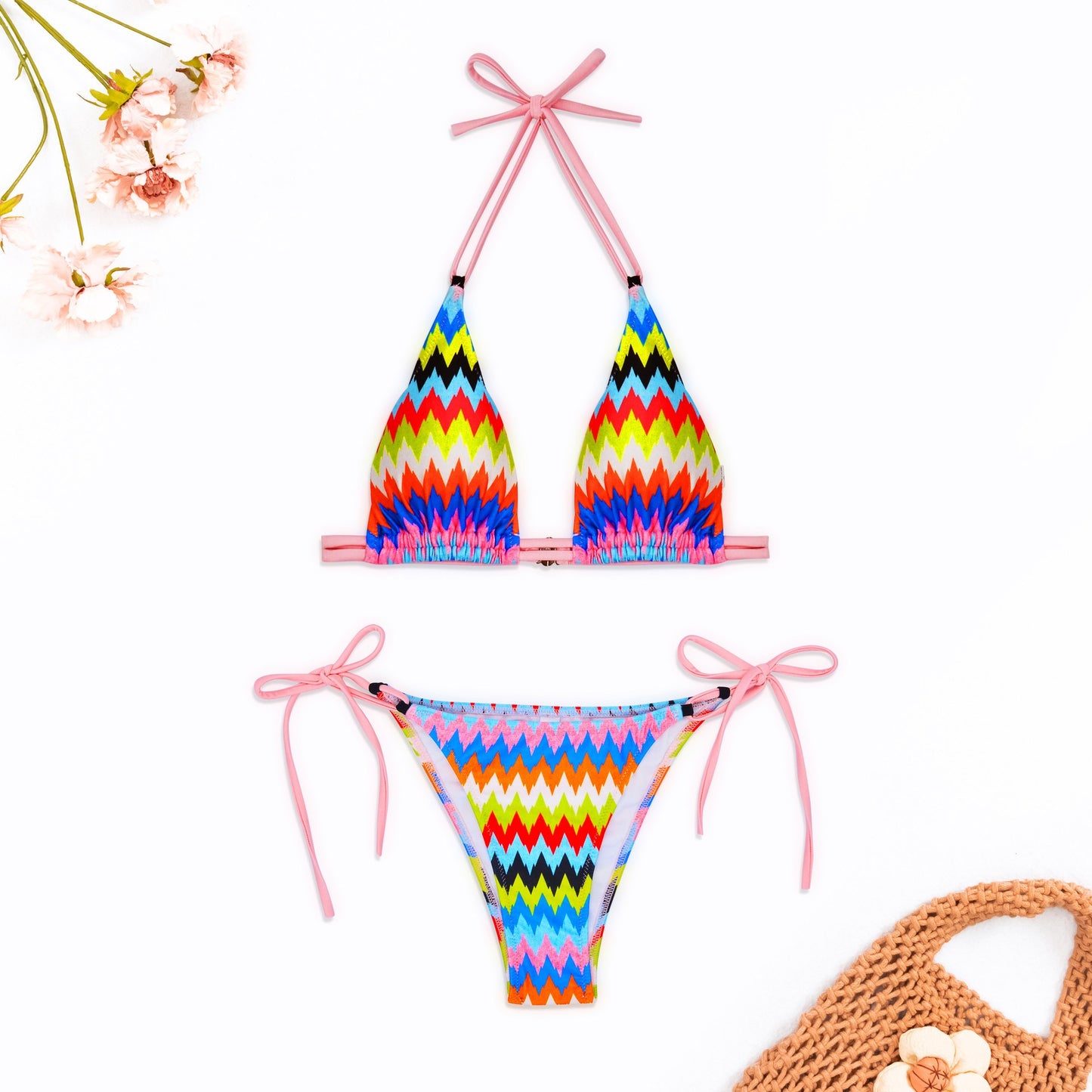 Colorful bikini set with a neck-tie top and multicolored bottom on a white background.