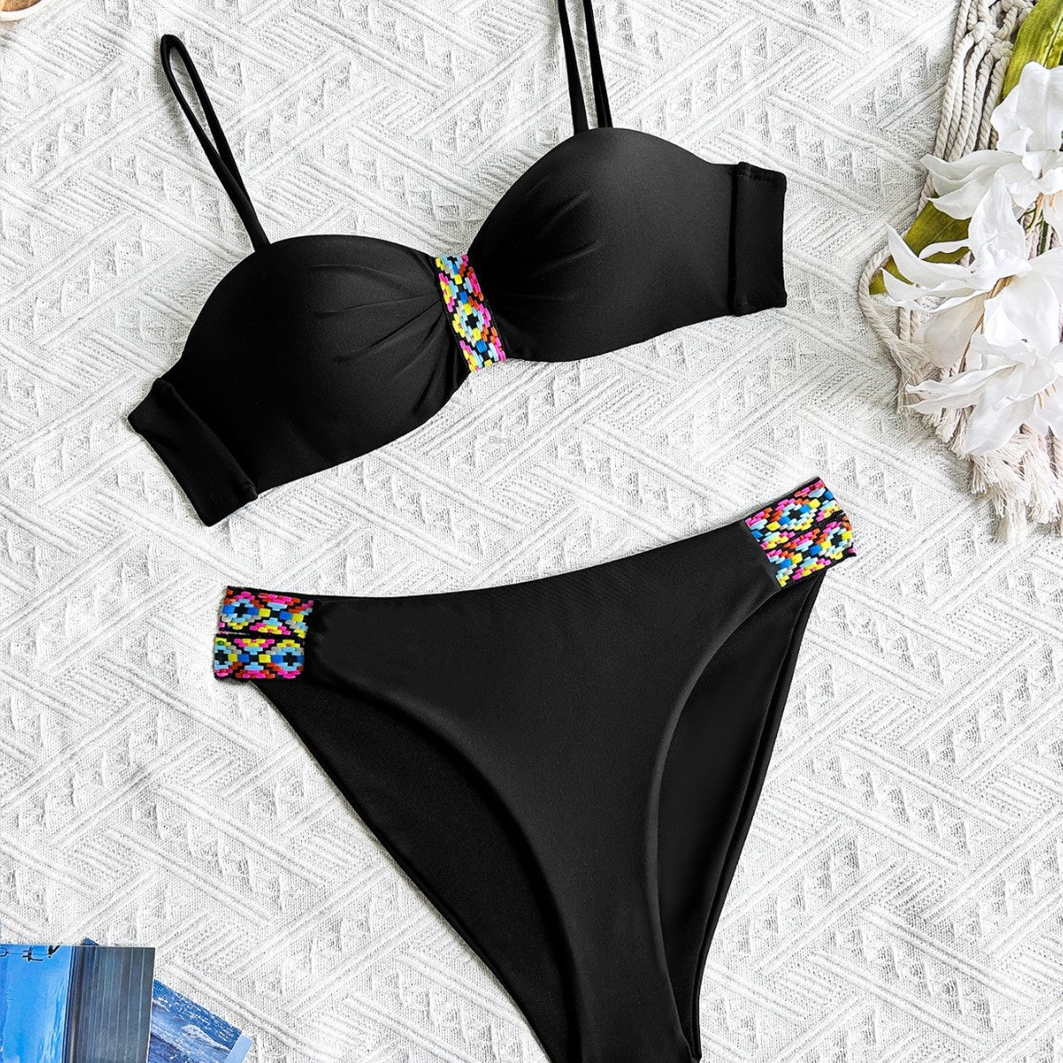Beautiful Black two-piece bikini with colorful accented stitching to add a flare.