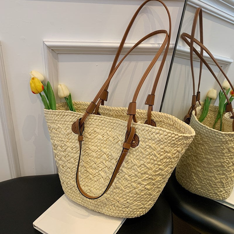 Woven handbag in an office sold at PeachyBeanz