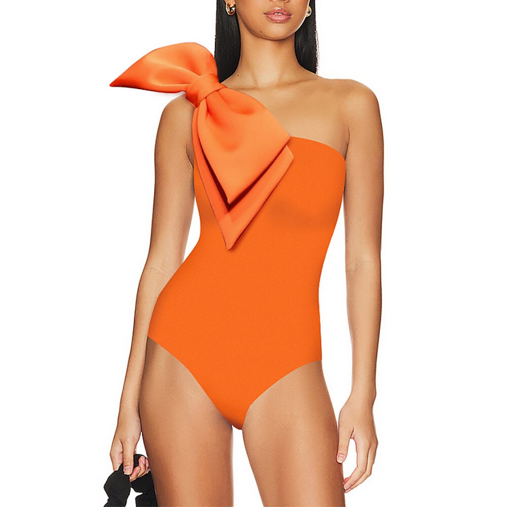 Women’s orange bowknot shoulder‑strap one‑piece swimsuit with ruched bodice.