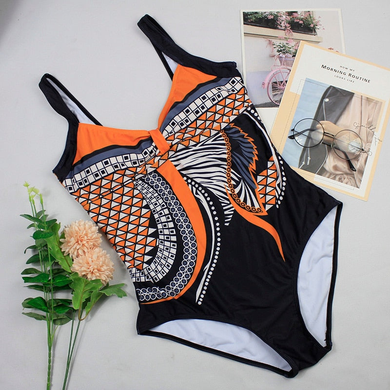 Vintage‑style push‑up printed swimsuit for women made of polyester and spandex, displayed on a plain background.