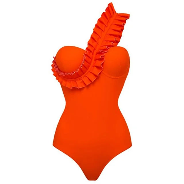 Orange ruffle backless one‑piece swimsuit with high‑cut leg and ruffle trim, shown against a neutral background.