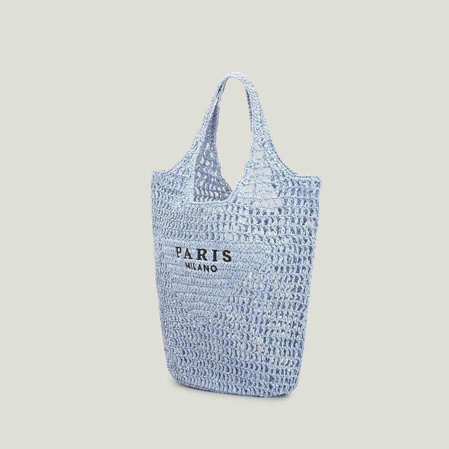 Woven tote bag with 'Paris Milano' text on a light gray background