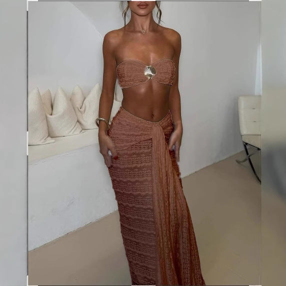 Lace jacquard seaside two‑piece set featuring a cropped lace top with scalloped hem and coordinating skirt; lightweight, breathable fabric with delicate floral jacquard.