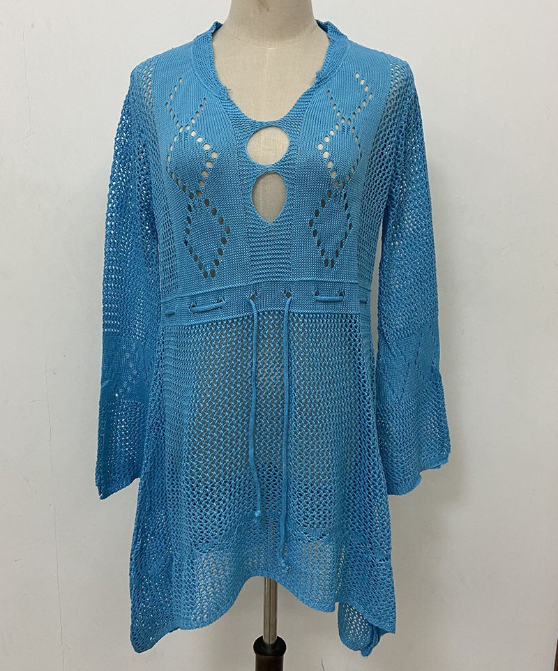 Lightweight flared beach cover shirt with hollow cutout pattern and relaxed fit.