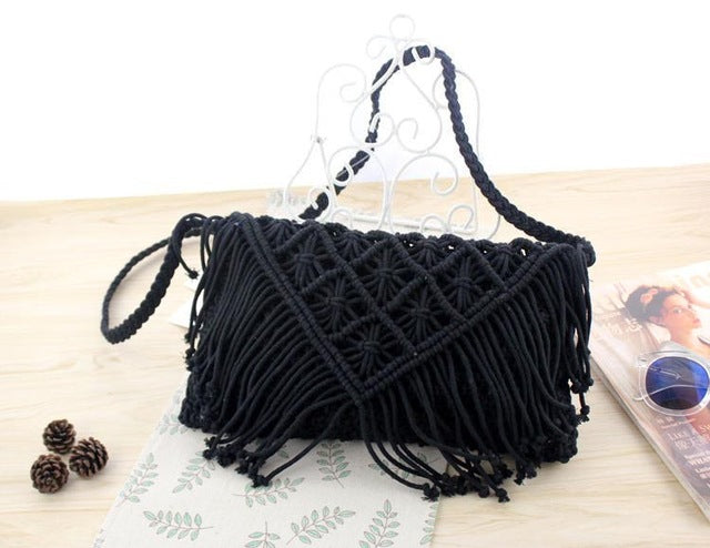 Woven handbag against a white background