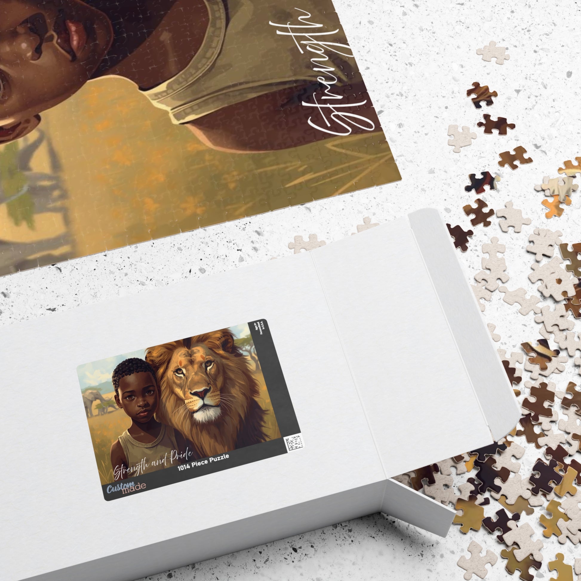 Jigsaw puzzle with a box featuring a boy and lion illustration, surrounded by scattered pieces on a textured surface.
