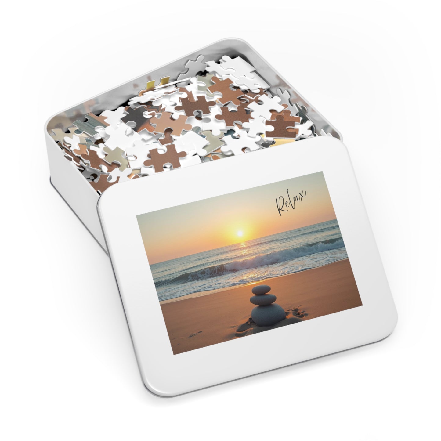 Jigsaw puzzle in a tin box with a beach scene and 'Relax' text on the lid.