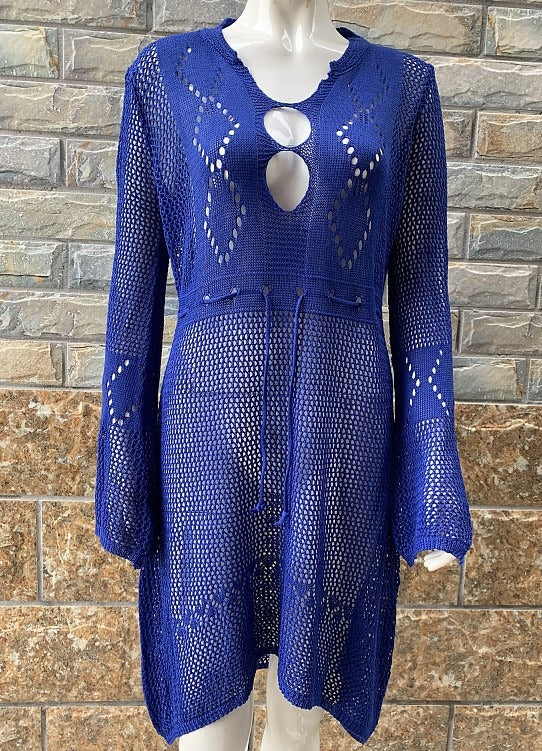 Lightweight flared beach cover shirt with hollow cutout pattern and relaxed fit.