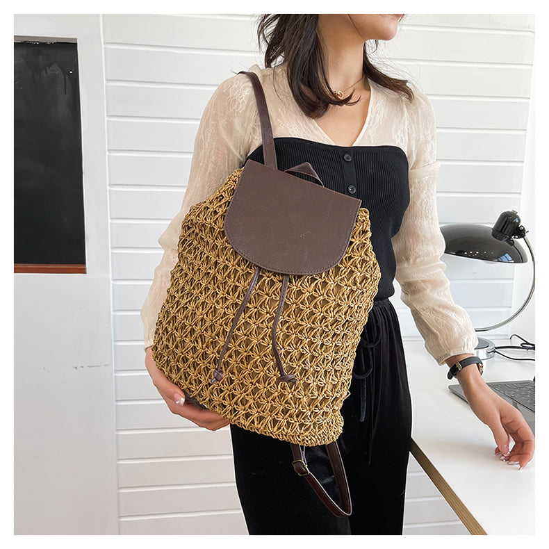 Person wearing a brown woven backpack in a kitchen setting sold at PeachyBeanz