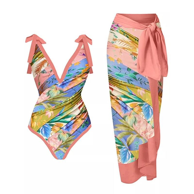Tropical floral two‑piece bikini with adjustable straps and high‑waist bottom.