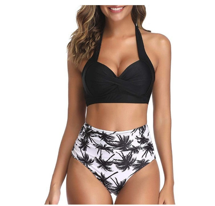 Woman wearing a multi-colored design swimsuit against a white background.