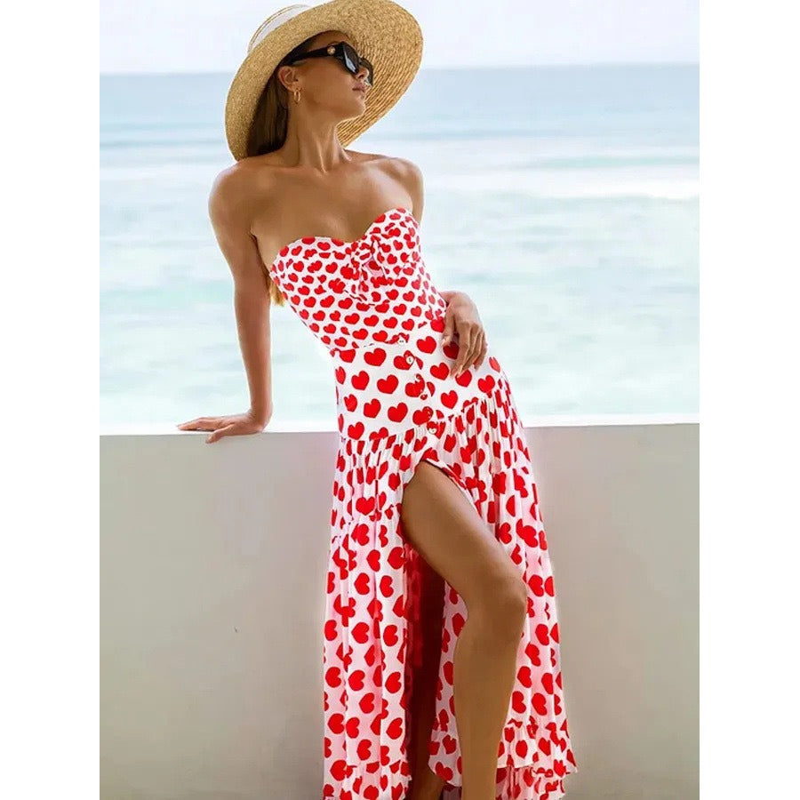 Retro printed one‑piece swimsuit with matching flowing skirt cover‑up; lightweight, semi‑sheer.
