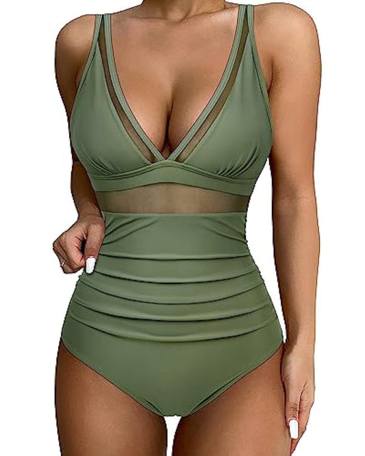 One-piece high‑waisted mesh swimsuit in light green displayed on a plain background.