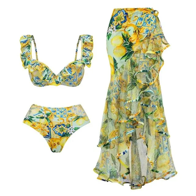 Woman wearing a swimsuit and coverup sold by PeachyBeanz.