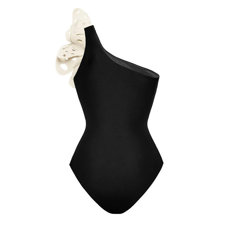 Black one-shoulder swimsuit on a white background