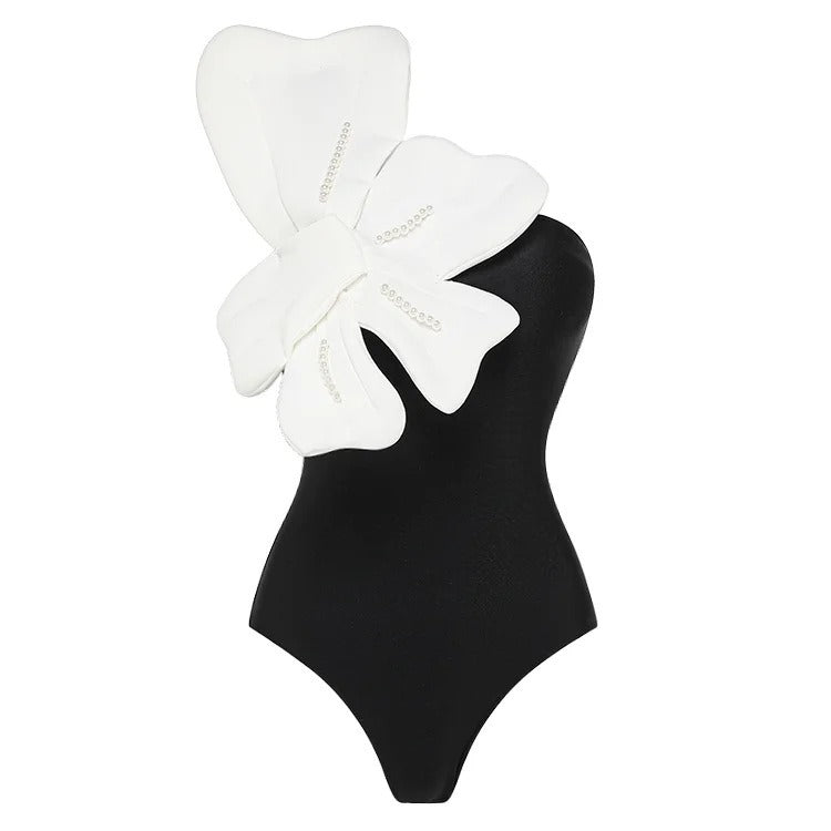 Black one-shoulder swimsuit on a white background
