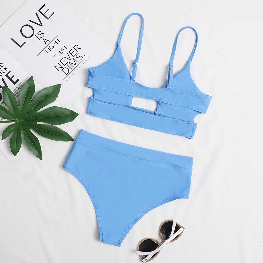 Low‑waist terylene bikinis set in solid color; two‑piece swimwear with flattering low‑rise bottoms and supportive top, quick‑drying and durable for beach and pool wear.