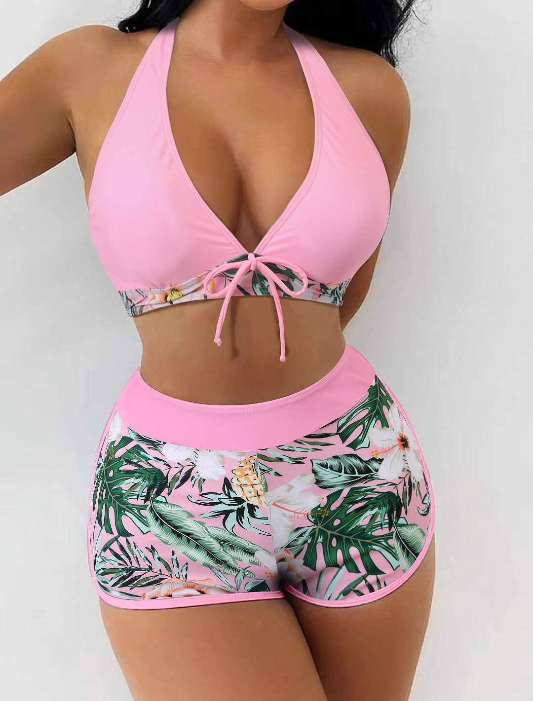 Women’s high‑waisted college‑style sports surfing swimsuit featuring a supportive tie‑back top with light padding and matching high‑waist bottoms designed for movement and comfort.