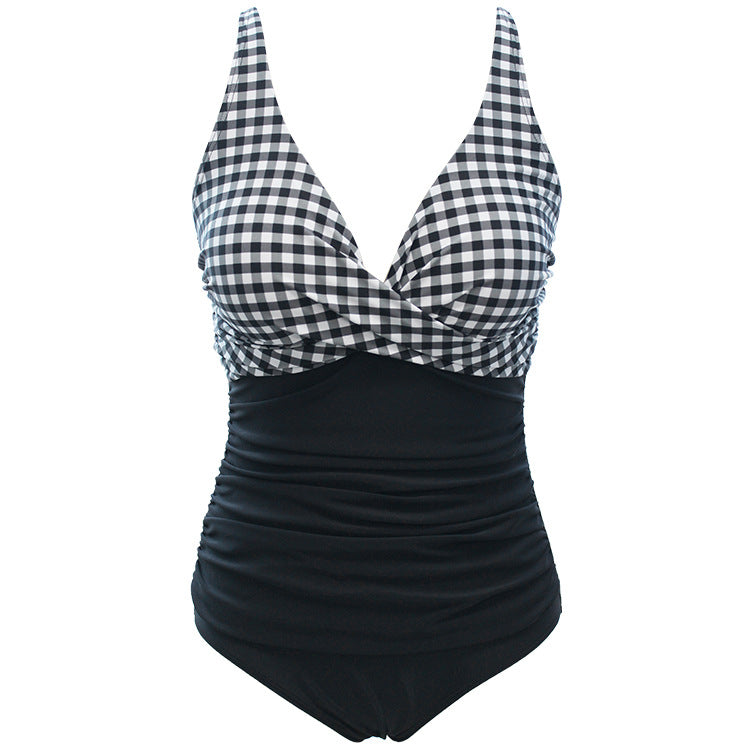 Women's backless one-piece swimsuit in solid color with fixed chest cup and sleeveless design, shown front view