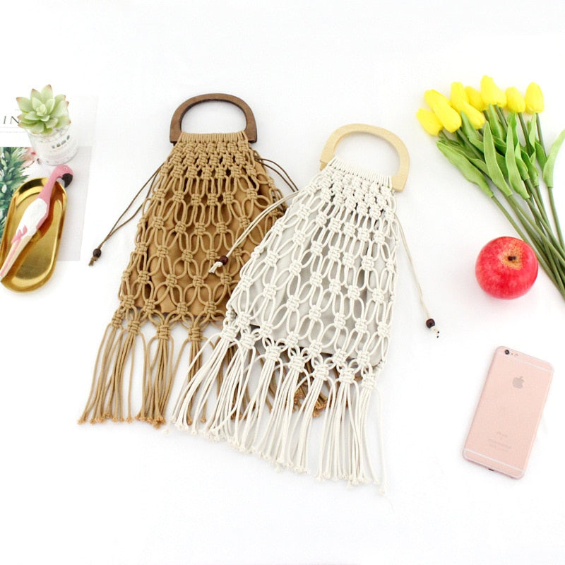 Woven handbags with wooden handles.