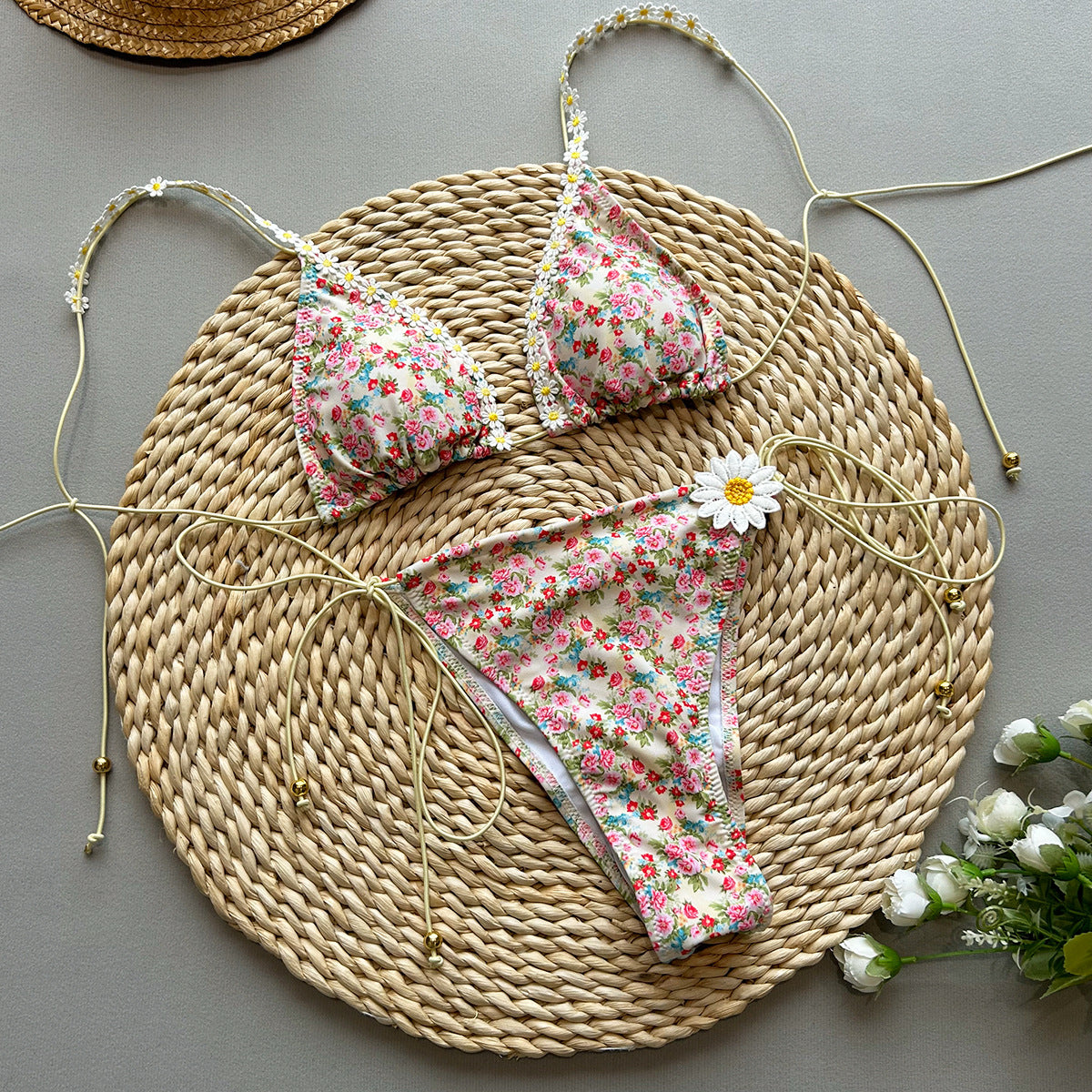 Floral bikini set on a woven surface