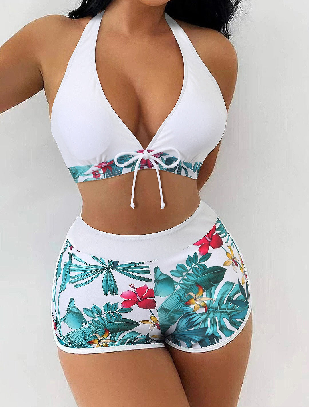 Women’s high‑waisted college‑style sports surfing swimsuit featuring a supportive tie‑back top with light padding and matching high‑waist bottoms designed for movement and comfort.