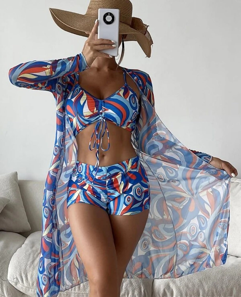 Three‑piece swim set with pattern print, high‑waisted bottoms, and matching top