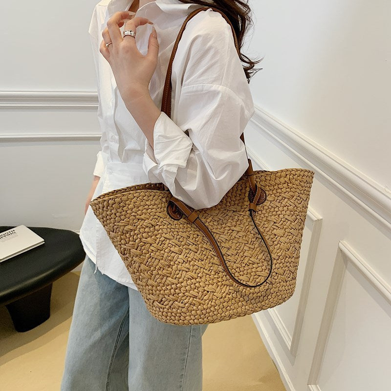 Woven handbag in an office sold at PeachyBeanz