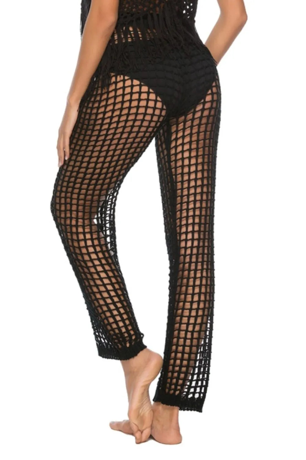 High‑waist cutout swim cover‑up pants with tie‑up closure in a solid color, displayed on a plain background.