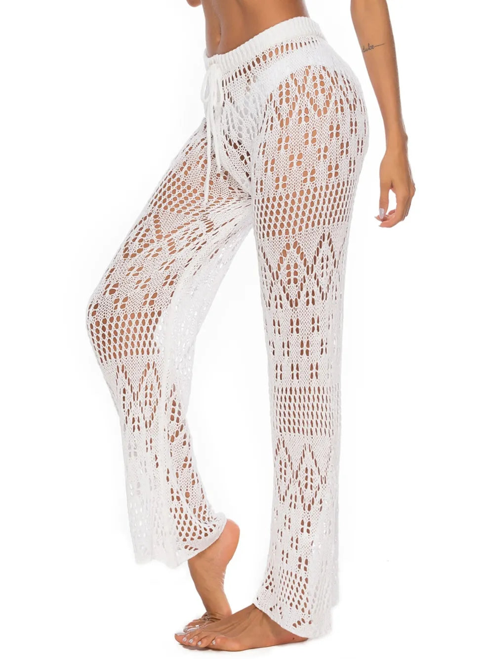 Straight-leg swim pants cover up with side cutouts; lightweight, quick-dry fabric and adjustable waist for beach-to-street style.