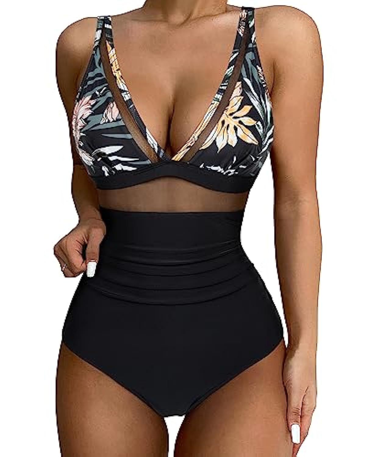 High‑waisted one‑piece swimsuit with mesh detailing, displayed on a clean studio background.