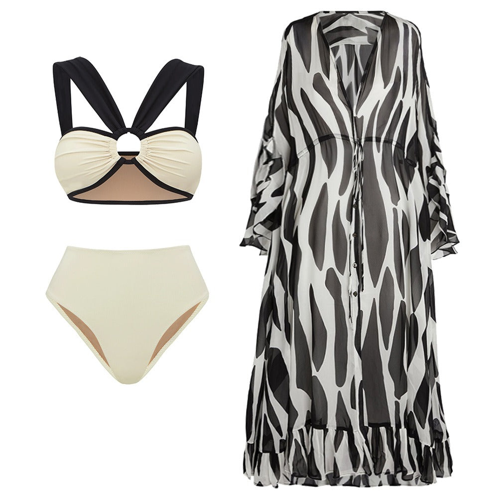 Modern black and white split bikini set featuring a high‑waisted bottom and matching top.