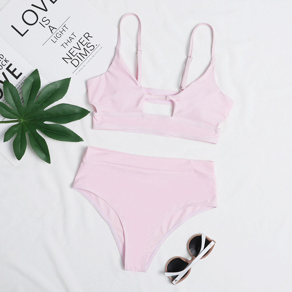 Low‑waist terylene bikinis set in solid color; two‑piece swimwear with flattering low‑rise bottoms and supportive top, quick‑drying and durable for beach and pool wear.