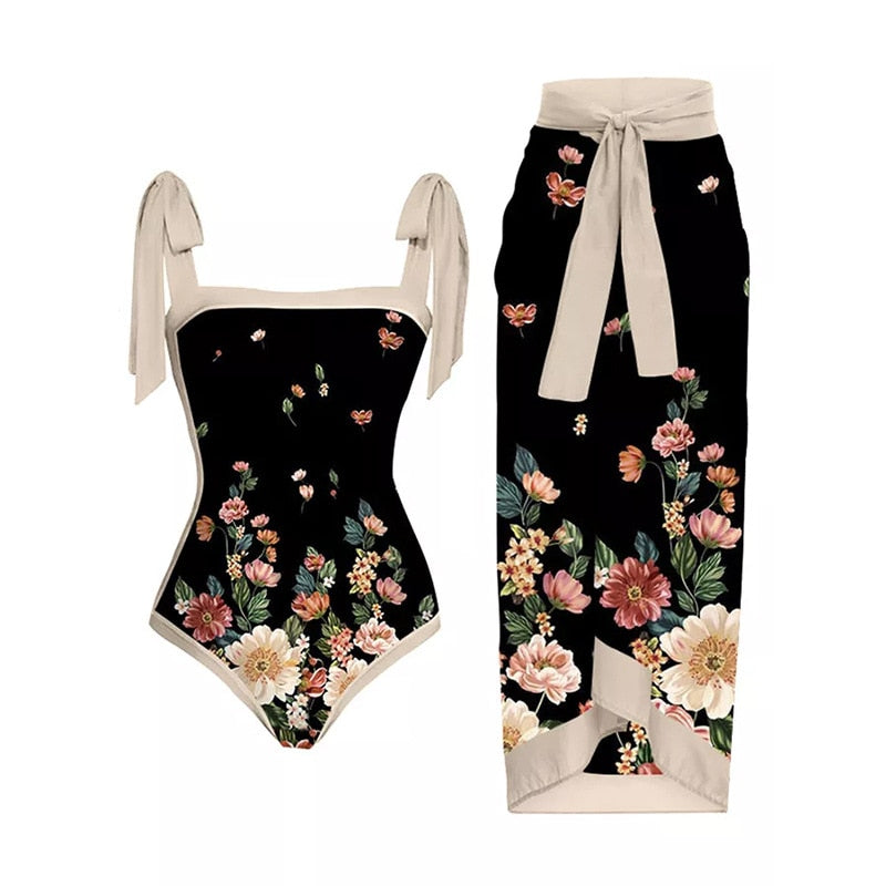 Tropical floral two‑piece bikini with adjustable straps and high‑waist bottom.