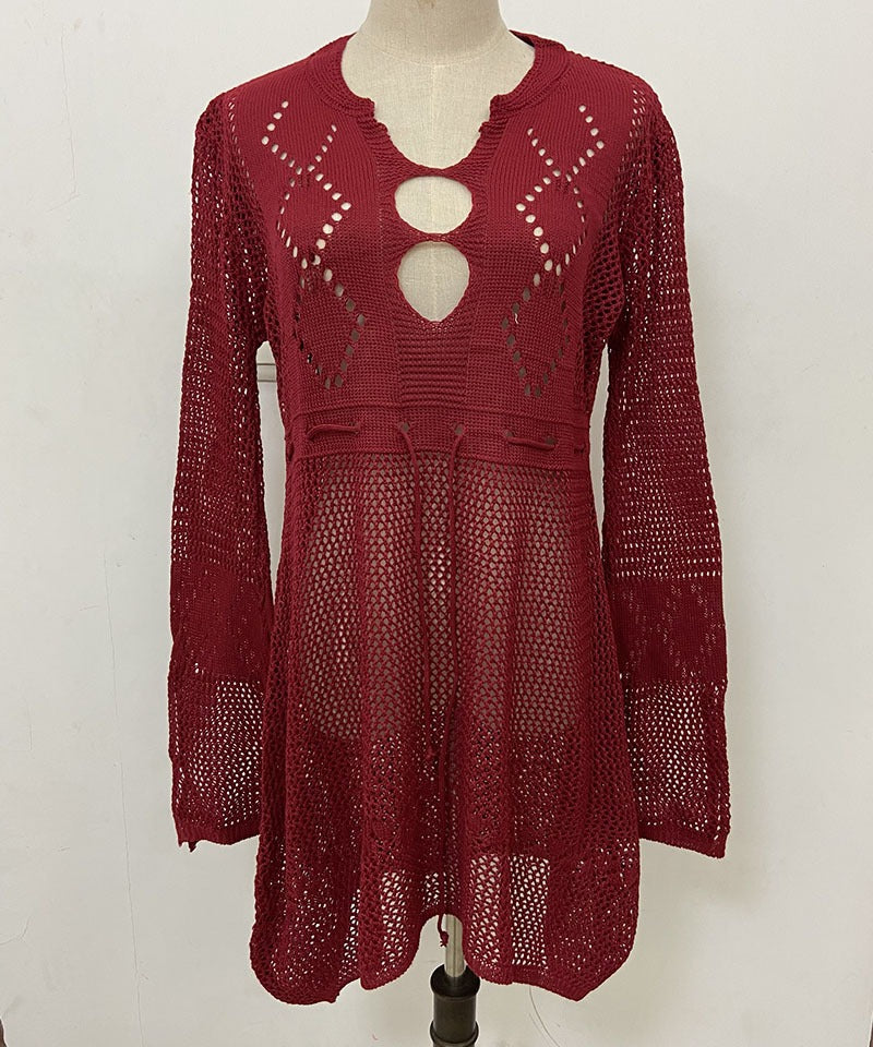 Lightweight flared beach cover shirt with hollow cutout pattern and relaxed fit.