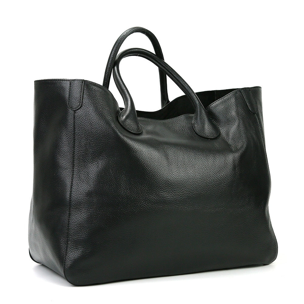 Black bag with a white background sold at PeachyBeanz.