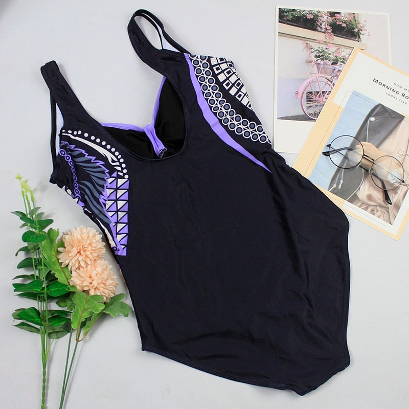 Vintage‑style push‑up printed swimsuit for women made of polyester and spandex, displayed on a plain background.
