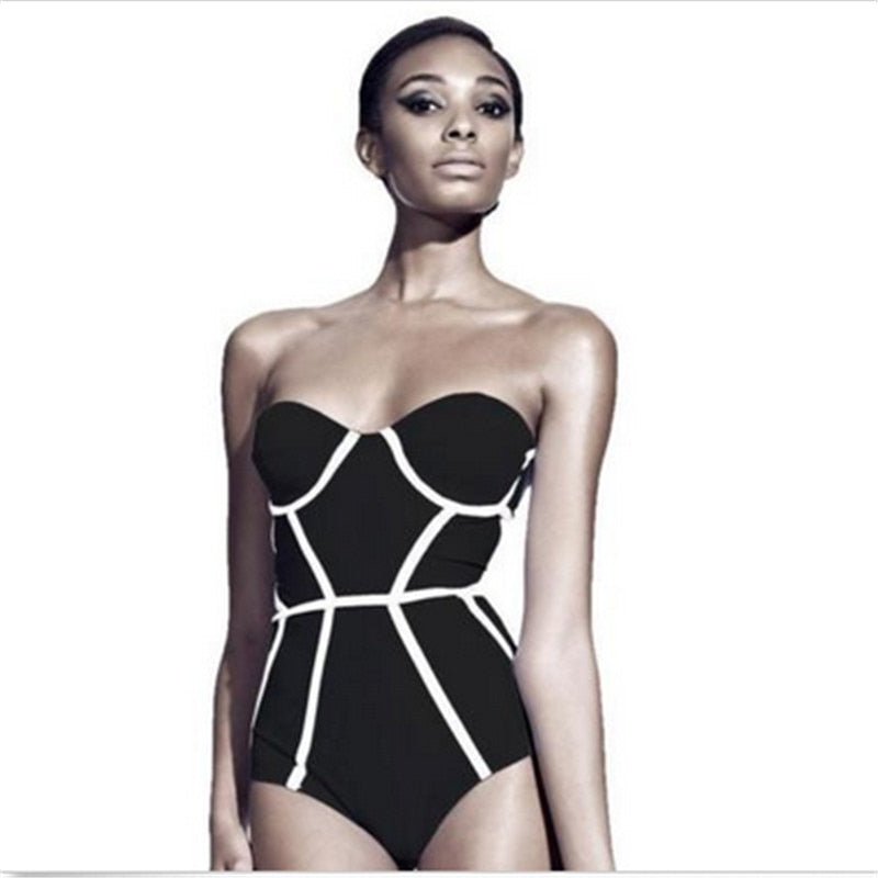 Black swimsuit with white geometric patterns 