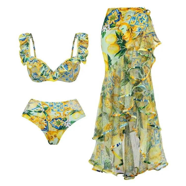 Woman wearing a swimsuit and coverup sold by PeachyBeanz.