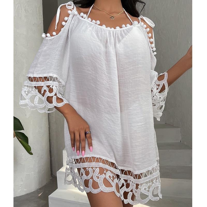White lace dress swimsuit cover-up with cut-out sleeves and hem on a neutral background