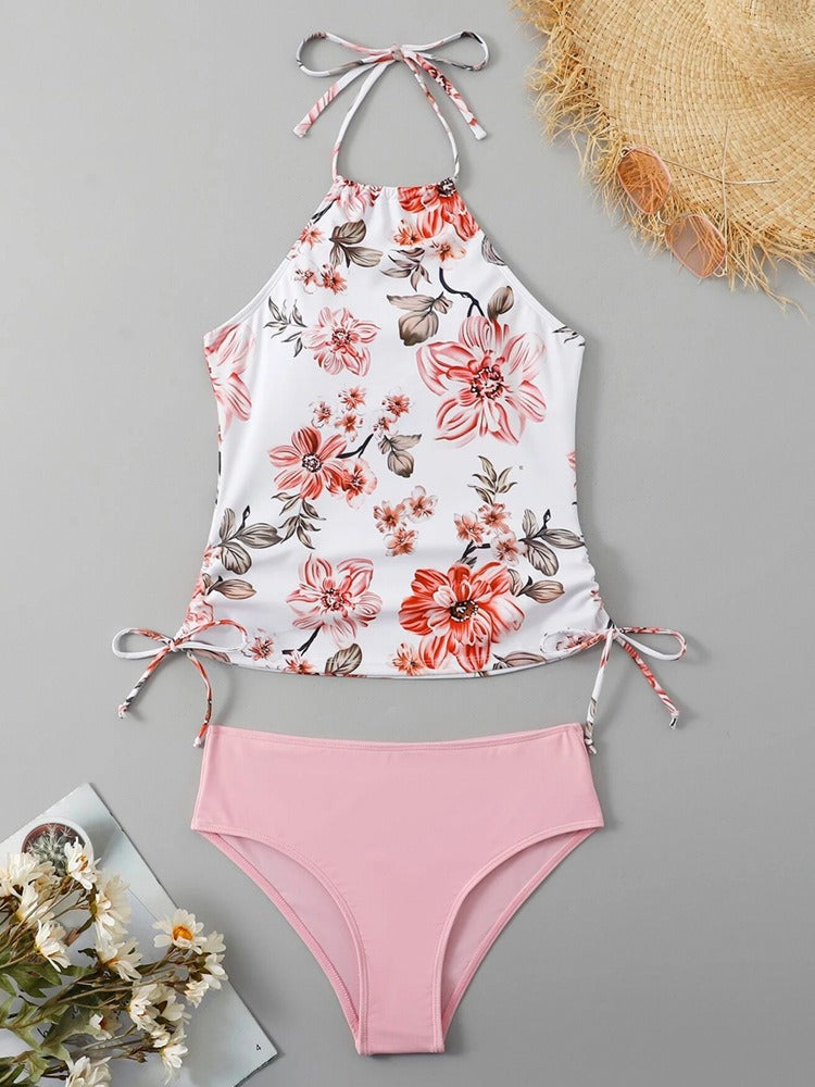 Front view of Dakota one‑piece swimsuit in Pink showing sleeveless cut and front split