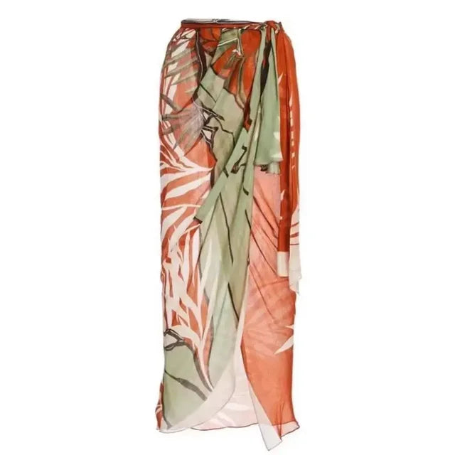 Skirt cover-up with leaf patterns against a white background