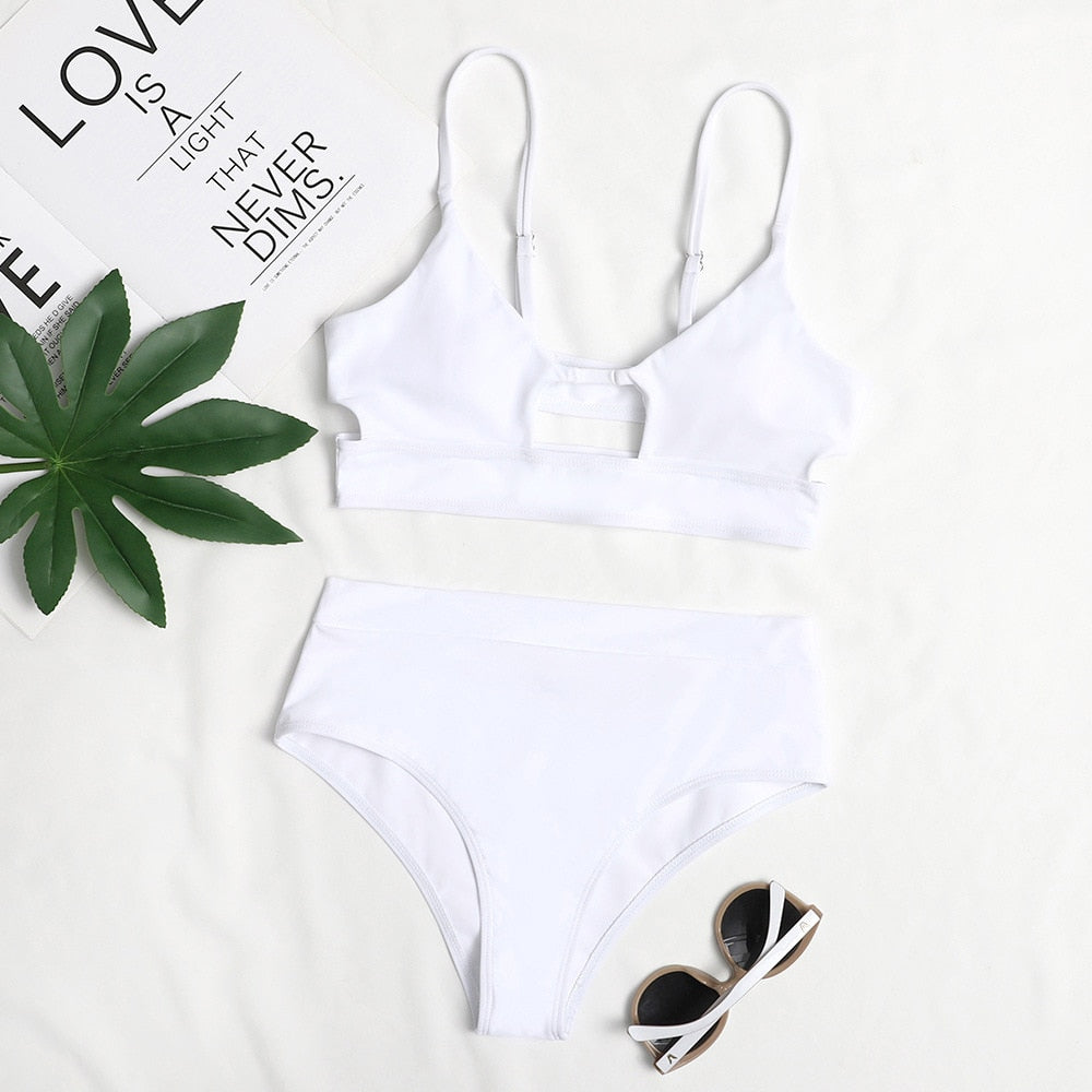Low‑waist terylene bikinis set in solid color; two‑piece swimwear with flattering low‑rise bottoms and supportive top, quick‑drying and durable for beach and pool wear.