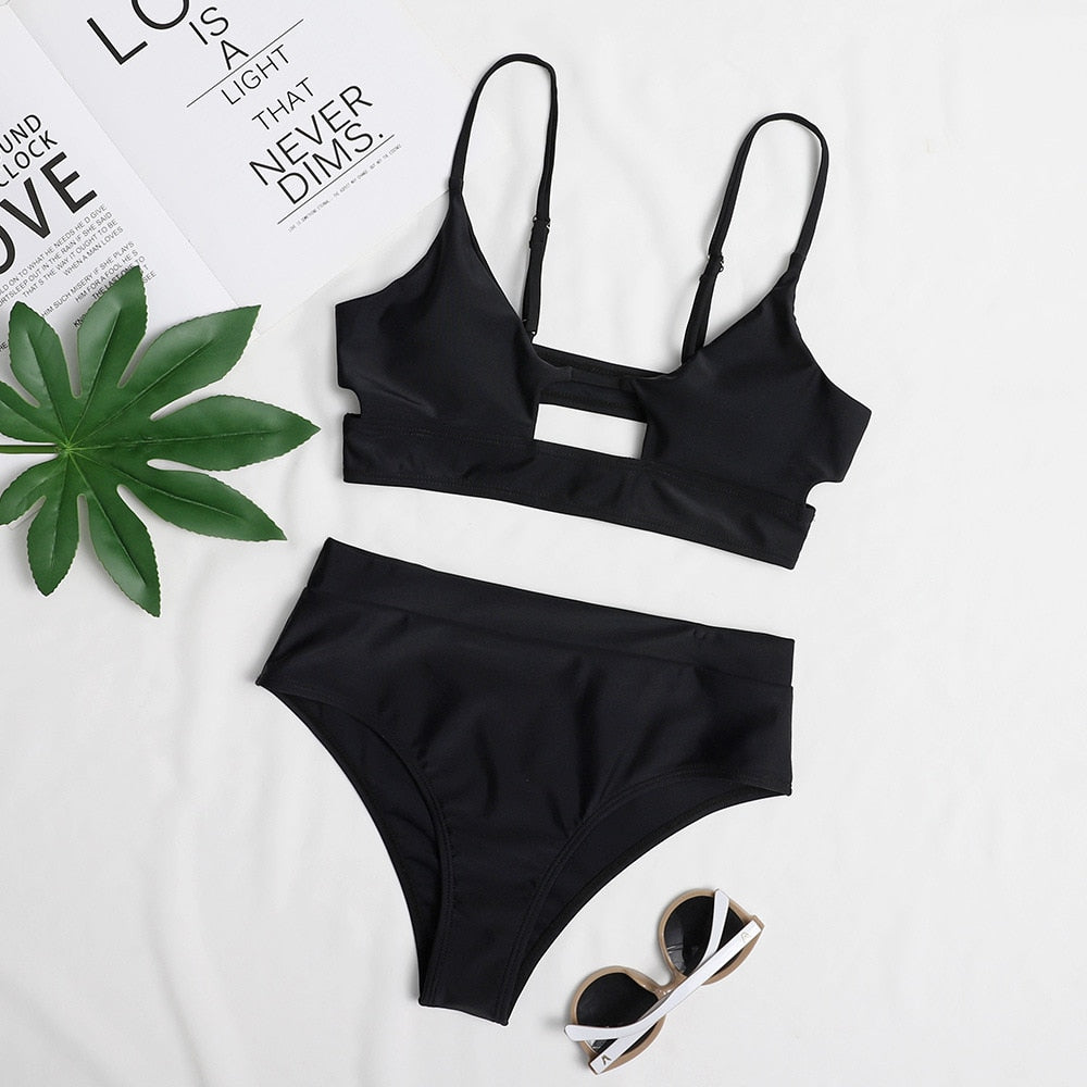 Low‑waist terylene bikinis set in solid color; two‑piece swimwear with flattering low‑rise bottoms and supportive top, quick‑drying and durable for beach and pool wear.