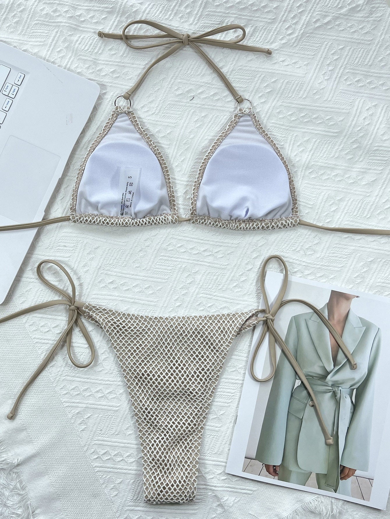 Beige triangle 2‑piece bikini swimsuit with spaghetti straps displayed on a white background.