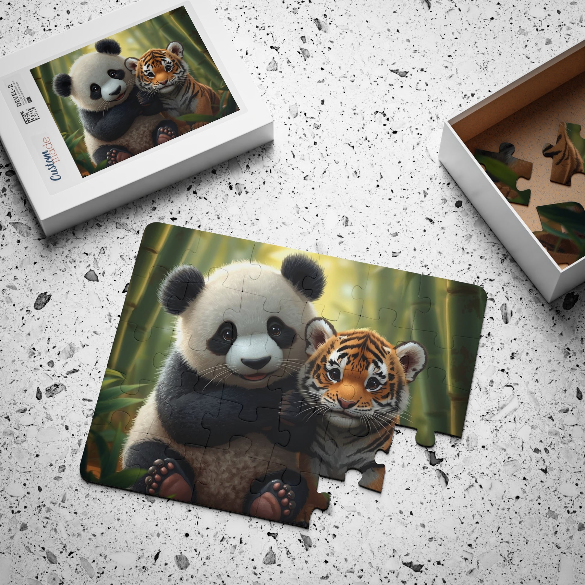 Panda and tiger puzzle on a textured surface with packaging in the background